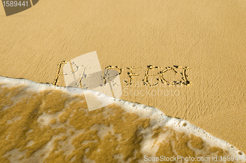 Image of inscription on the sand