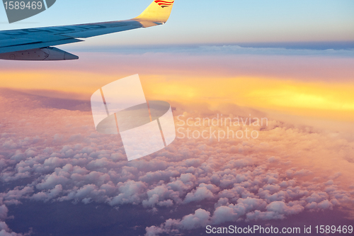 Image of View from airplane window inside the clouds