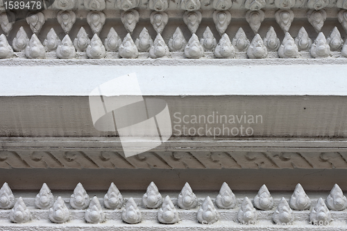 Image of White stucco , thai style on the Wall