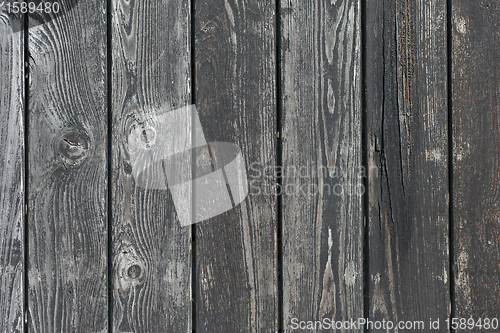 Image of dark wood texture with natural patterns