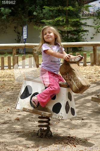 Image of the little girl on the horse