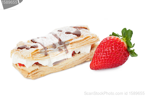 Image of Dessert with whipped cream, chocolate and strawberry