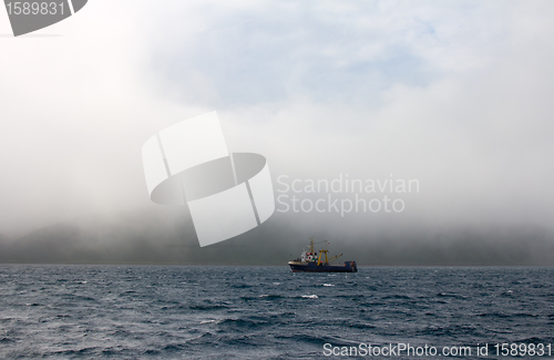 Image of Fishing trawler during a storm in Pacific ocean