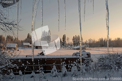 Image of winter evening in village. russia