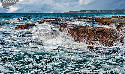 Image of waves on rocks at the coast
