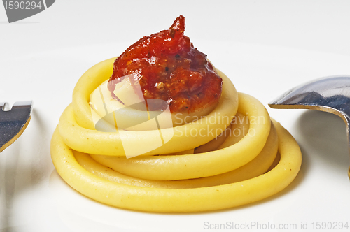 Image of macaroni with tomato sauce