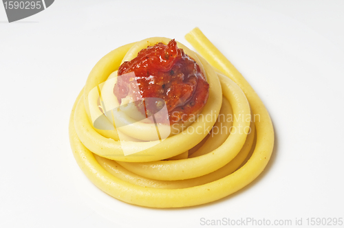 Image of macaroni with tomato sauce