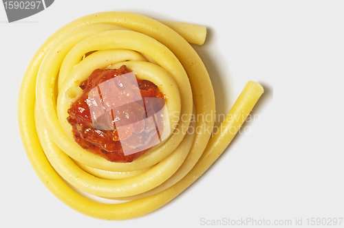 Image of macaroni with tomato sauce