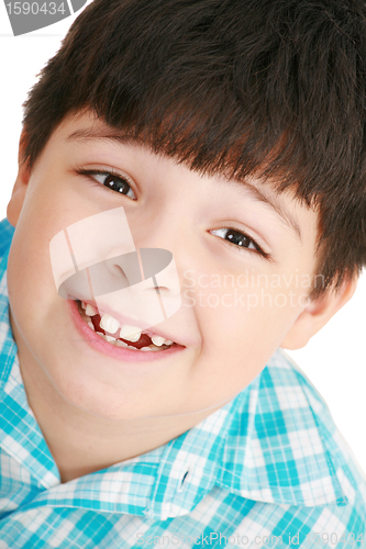 Image of Photo of adorable young boy looking at camera 