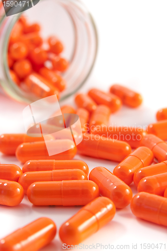Image of bunch of orange pills