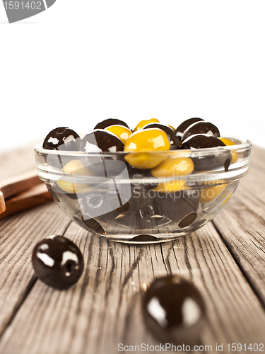 Image of Olives on a wooden table