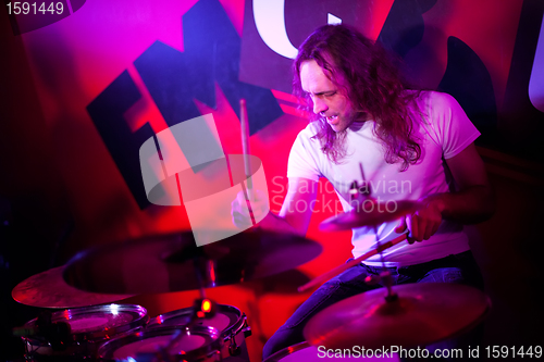 Image of playing drums