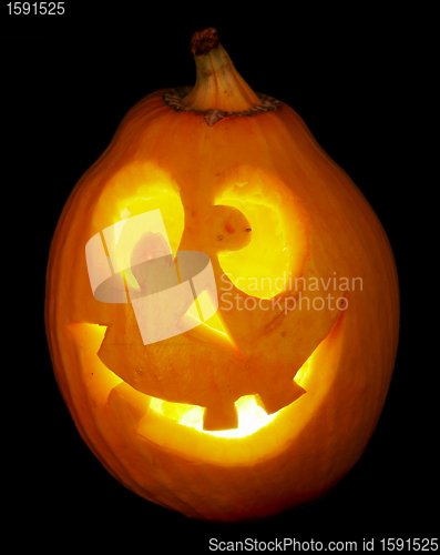 Image of scary old jack-o-lantern on black.