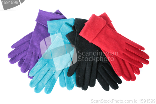 Image of Multi-coloured woollen gloves on a white background