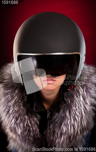 Image of Biker girl in a helmet