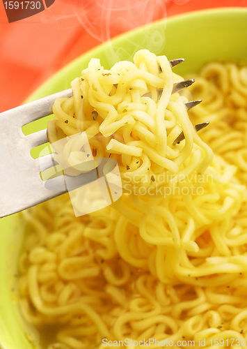 Image of Hot and tasty noodles on a plug.