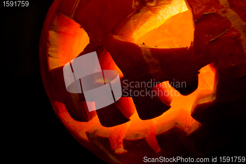 Image of halloween, old jack-o-lantern on black