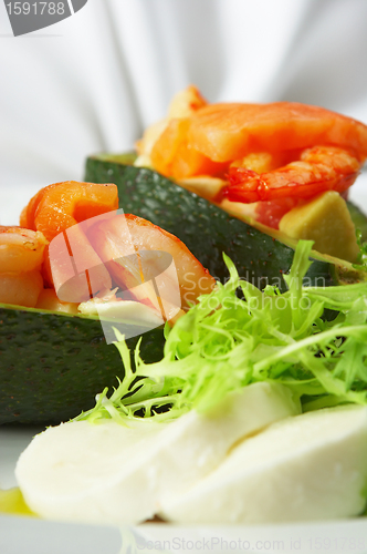 Image of Tasty Dish behind a dining table.Cold snack...