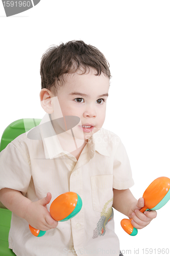 Image of boy with maracas, isolated on white