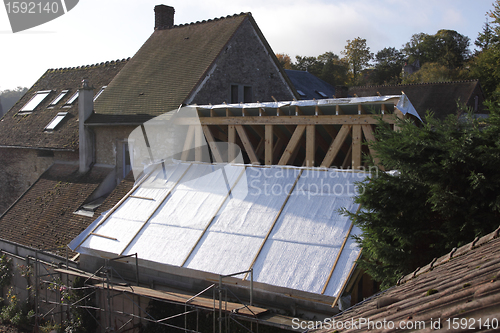 Image of construction of the wooden frame of a roof