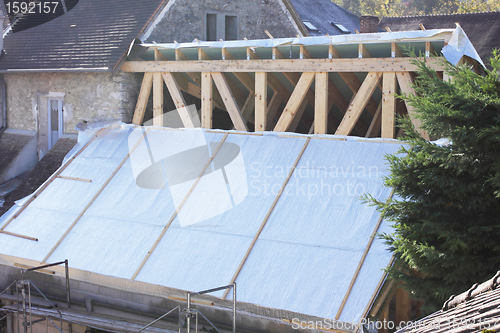 Image of construction of the wooden frame of a roof