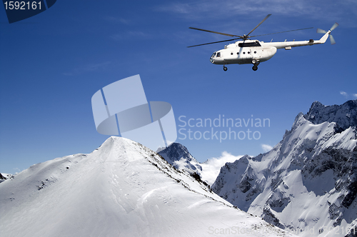 Image of Helicopter in snowy mountains