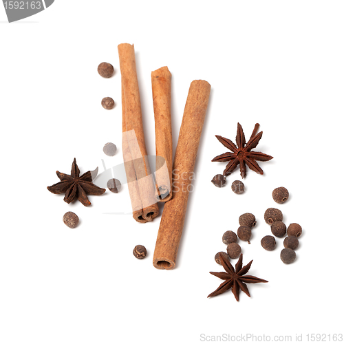 Image of Black peppercorns, anise stars and cinnamon sticks