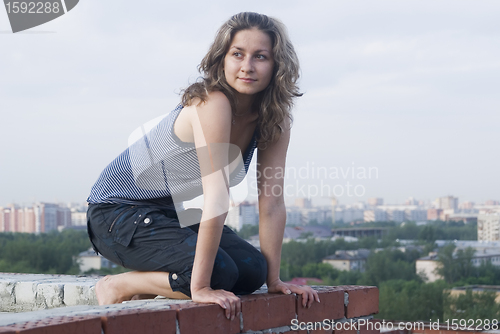 Image of Girl on roof