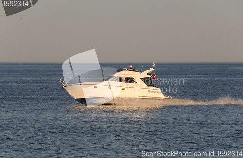 Image of Fast motorboat in eveningsun