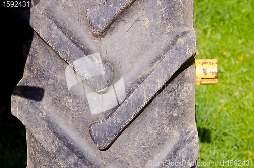 Image of Tractor tire protector closeup background detail 