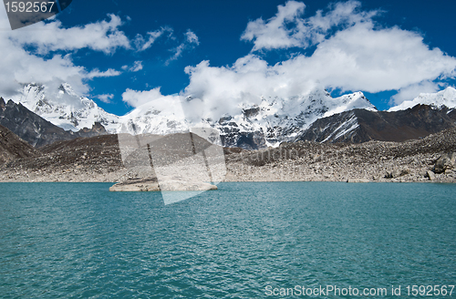 Image of Clouds and Sacred Lake near Gokyo in Himalayas