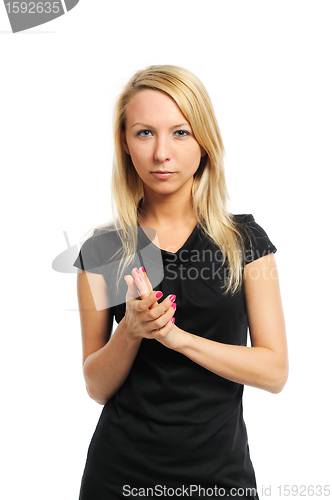 Image of Young woman rubbing hands