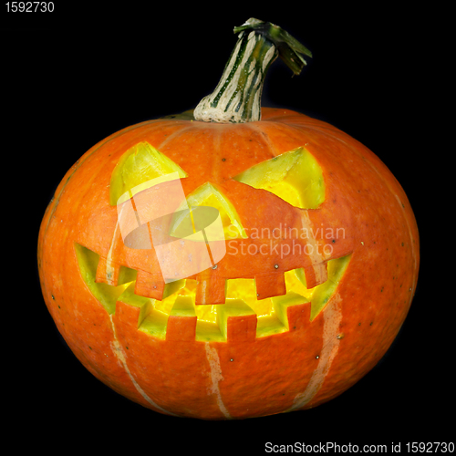 Image of A scary old jack-o-lantern on black.
