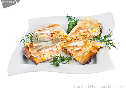 Image of Four sandwiches on a plate