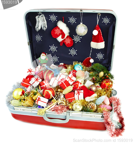 Image of big suitcase with gifts for Christmas