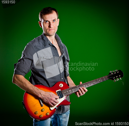 Image of man with a guitar