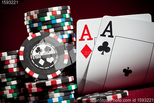 Image of chips and two aces