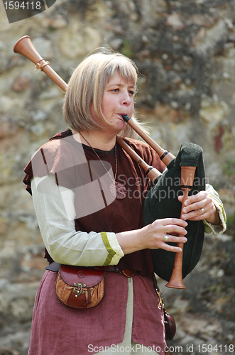 Image of Female bagpiper