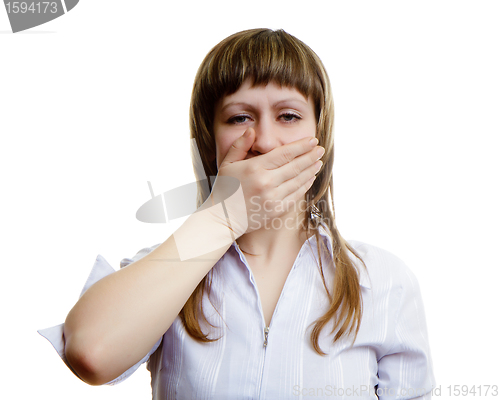 Image of young girl covers her mouth with his hands