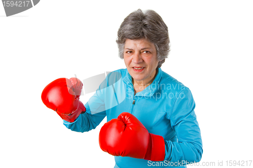 Image of Female senior with boxing gloves