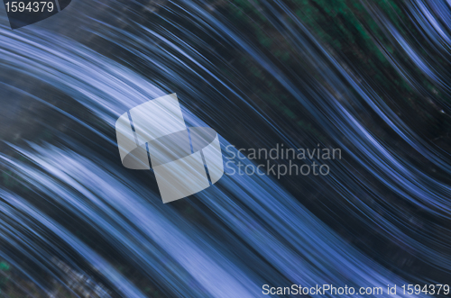 Image of wave and blue reflection