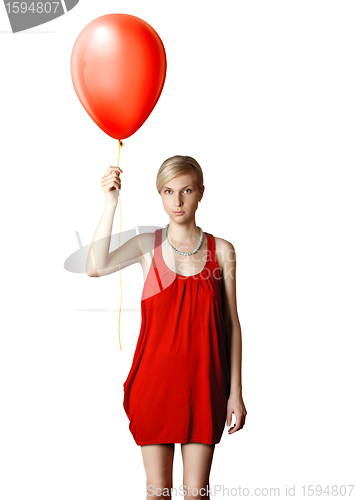 Image of blonde in red dress with the balloon