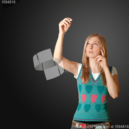 Image of businesswoman writing something