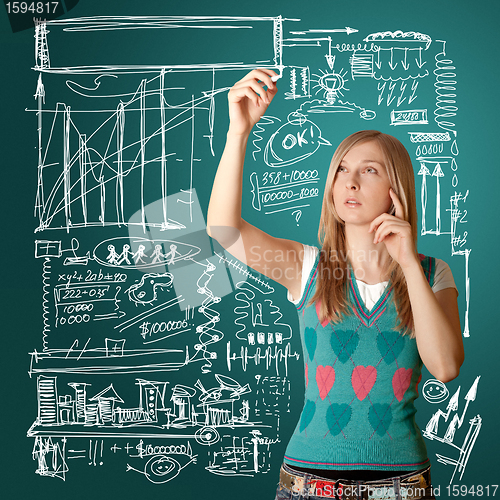 Image of businesswoman writing something