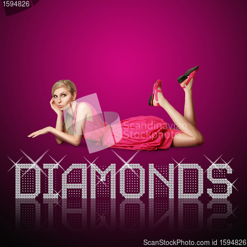 Image of diamond letters and blond woman