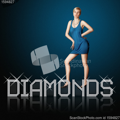 Image of diamond letters and blond woman