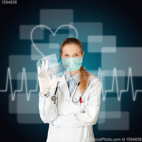 Image of doctor woman with electrocardiogram