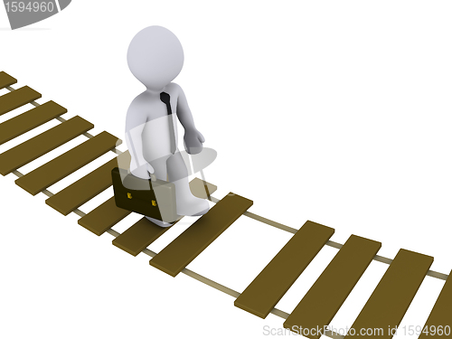 Image of Businessman walking on damaged bridge