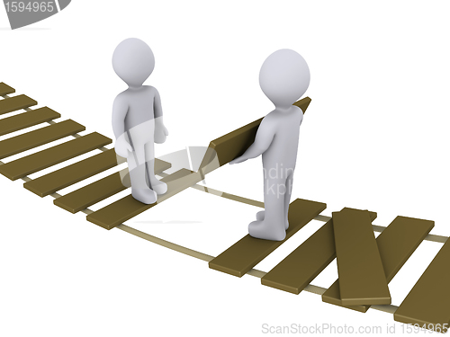 Image of Person on bridge helping another