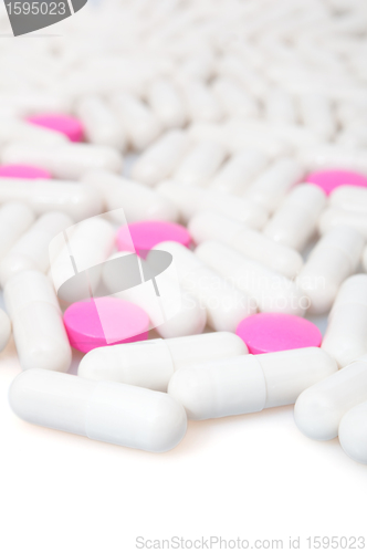 Image of Pink Pills and White Capsule